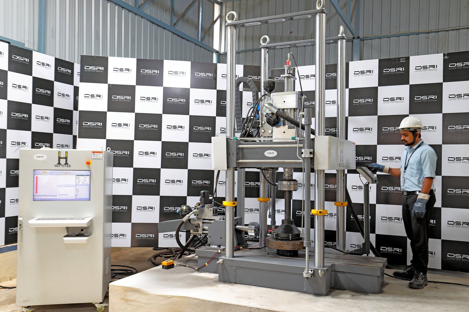 Servo-hydraulic test frame and controller